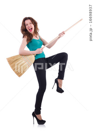 Young woman with broom isolated on white Young woman with broom isolated on white 16698937