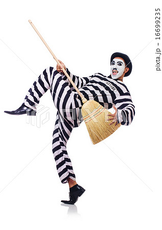 Prisoner with broom isolated on the white Prisoner with broom isolated on the white 16699235
