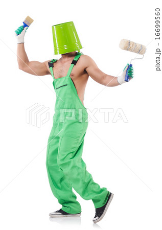 Painter in green coveralls on white 16699560
