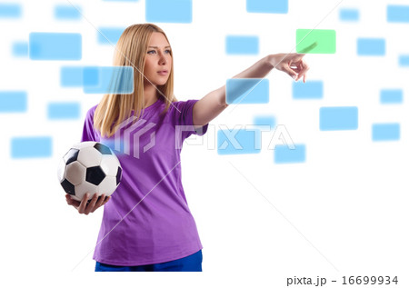 Woman with football pressing virtual buttons Woman with football pressing virtual buttons 16699934