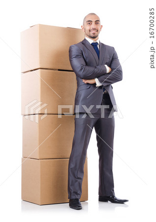 Businessman with box isolated on the white Businessman with box isolated on the white 16700285