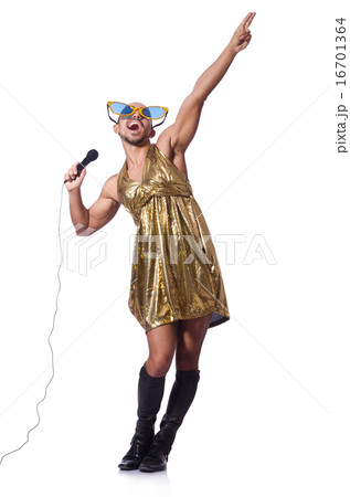 Man in female clothing singing with mic 16701364