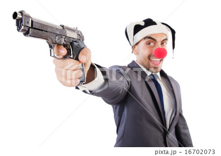Businessman clown with gun isolated on white Businessman clown with gun isolated on white 16702073