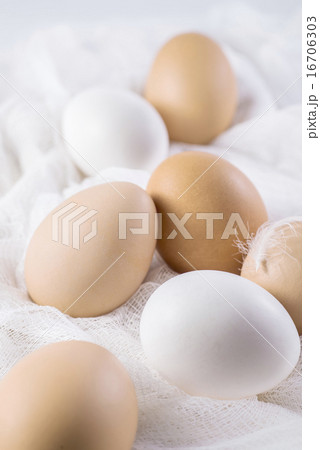 Brown and white eggs on cloth country style 16706303