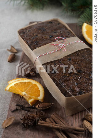 Christmas fruit cake pieces on board paper 16706330