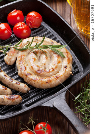 Grilled sausages and beer mug Grilled sausages and beer mug 16707691