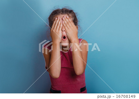Girl European appearance decade closed eyes with his hands opene Girl European appearance decade closed eyes with his hands opene 16708149