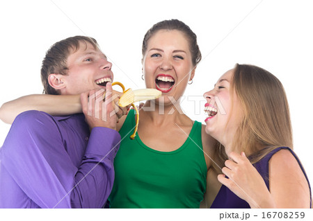 Photo of three happy friends with banana Photo of three happy friends with banana 16708259