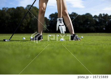 Woman playing golf on field, bright colorful vivid theme Woman playing golf on field, bright colorful vivid theme 16715889