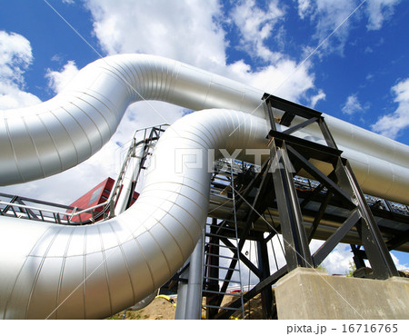 Industrial zone, Steel pipelines  against blue sky 16716765