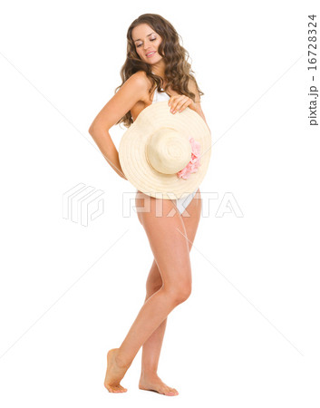 Full length portrait of glamour young woman in swimsuit holding Full length portrait of glamour young woman in swimsuit holding 16728324