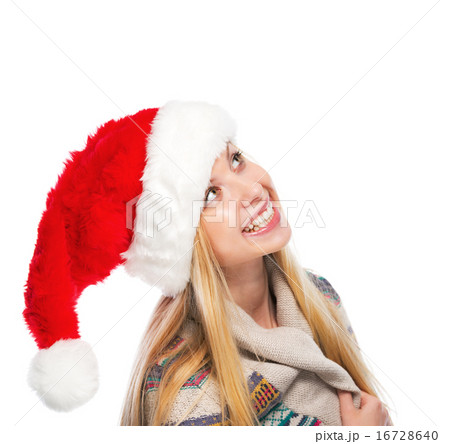 Portrait of smiling teenage girl in santa hat looking on copy sp 16728640