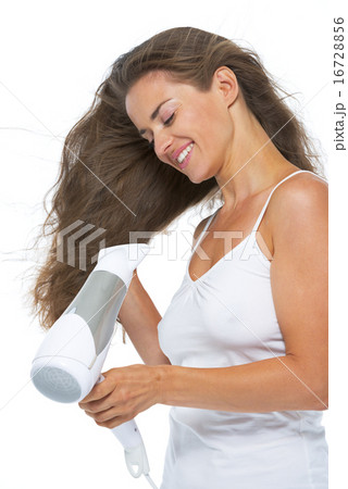 Happy young woman blow-dry 16728856