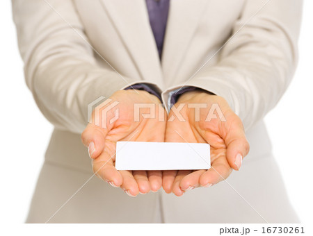 Closeup on business card in hand of business woman 16730261