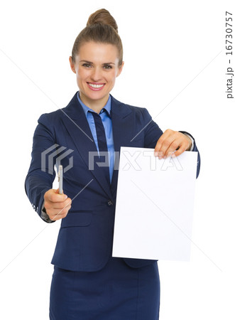 Smiling business woman giving document and pen Smiling business woman giving document and pen 16730757