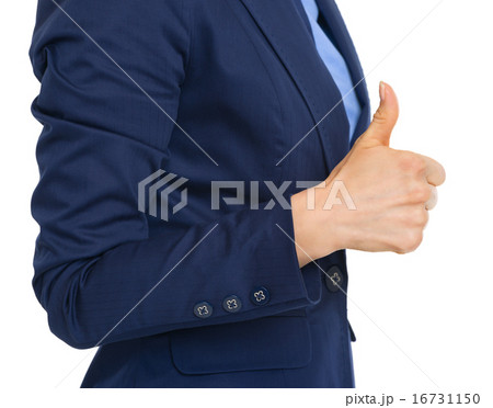 Closeup on business woman showing thumbs up Closeup on business woman showing thumbs up 16731150