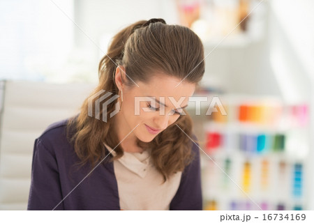 Fashion designer working in office 16734169