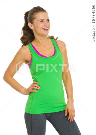 Smiling fitness young woman looking on copy space 16734666