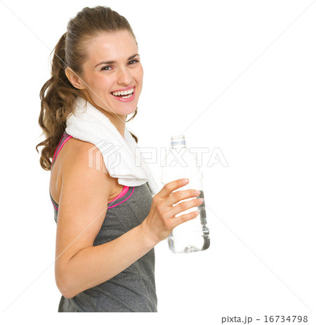 Portrait of happy fitness young woman with bottle of water Portrait of happy fitness young woman with bottle of water 16734798