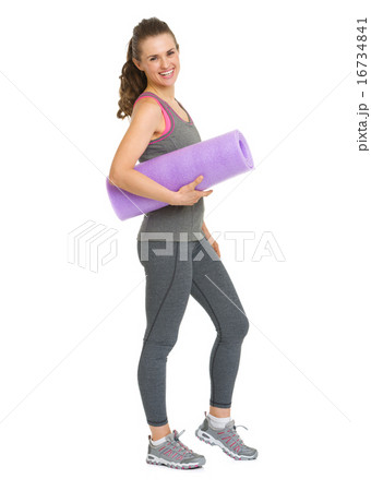 Full length portrait of smiling healthy young woman with fitness 16734841
