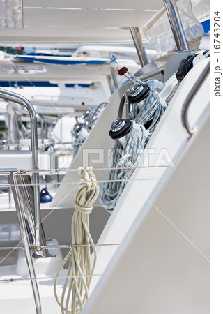 Winches and ropes, sailing yacht detail Winches and ropes, sailing yacht detail 16743204