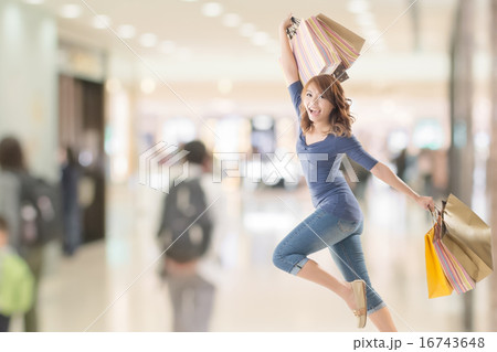 Cheerful shopping woman 16743648