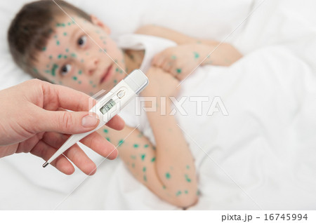 temperature measurement sick boy in bed temperature measurement sick boy in bed 16745994