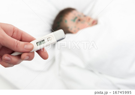 sick boy and thermometer with high temperature sick boy and thermometer with high temperature 16745995