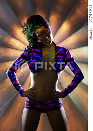 Image of sexy club dancer posing in neon light Image of sexy club dancer posing in neon light 16747915