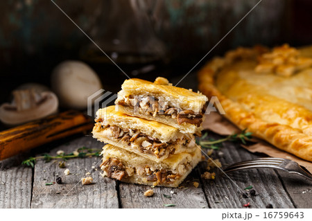 Homemade pie stuffed with mushrooms Homemade pie stuffed with mushrooms 16759643