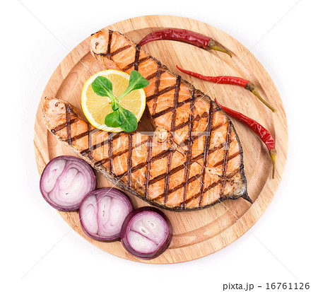 salmon steaks on platter 16761126
