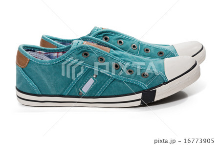 Pair of green canvas sneakers 16773905