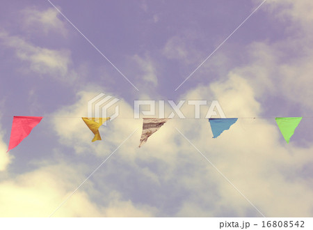 Colorful bunting flags on blue sky  16808542