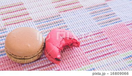 Sweet and colourful french macaroons on cotton cloth background. 16809066