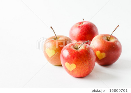 Red apples with a heart symbol Red apples with a heart symbol 16809701