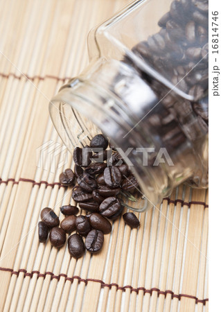 Coffee beans spilled from bottle Coffee beans spilled from bottle 16814746