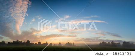 Misty meadow at dawn panorama 16815455