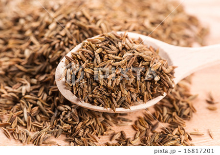 Cumin seeds in wooden spoon Cumin seeds in wooden spoon 16817201