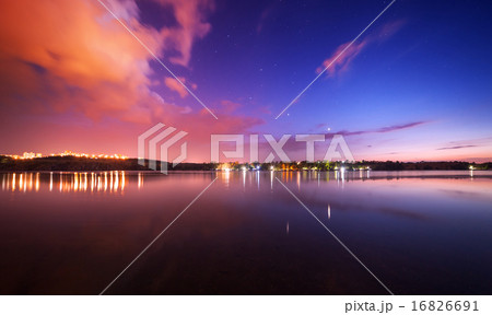 Night sky at the river with stars and clouds Night sky at the river with stars and clouds 16826691