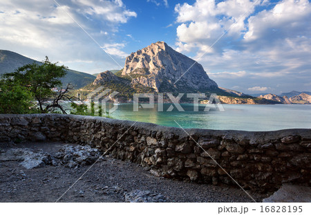 Beautiful summer sunset at the sea with mountains  16828195
