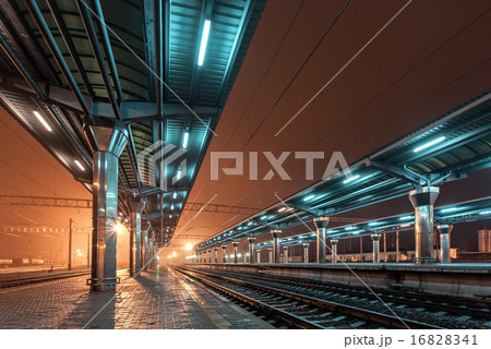 Railway station at night. Train platform. Railroad 16828341