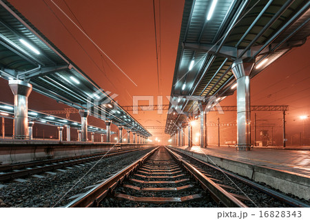 Railway station at night. Train platform. Railroad 16828343