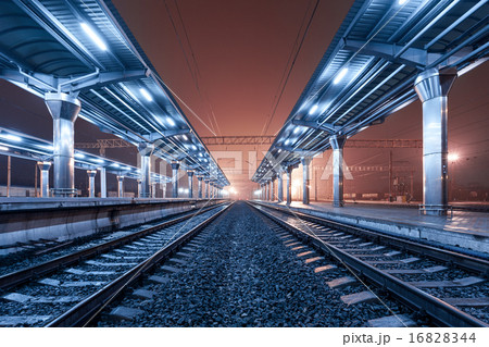 Railway station at night. Train platform. Railroad 16828344