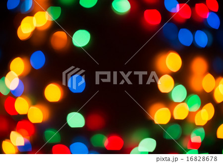 Defocused multicolored lights background Defocused multicolored lights background 16828678