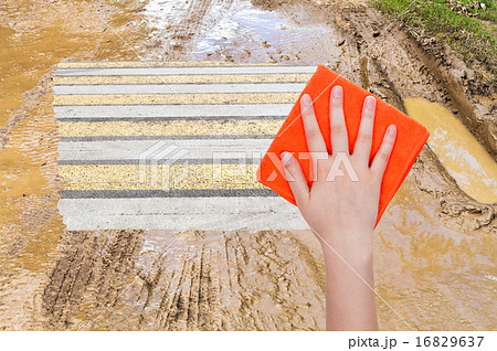 hand deletes mug on country road by orange cloth hand deletes mug on country road by orange cloth 16829637