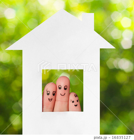 Finger art of a family. Family looking out of hous Finger art of a family. Family looking out of hous 16835127