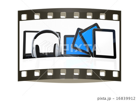 headphones on laptop and tablet pc. film strip headphones on laptop and tablet pc. film strip 16839912