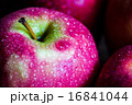 Macro shoot of an apple with drops of water on it 16841044