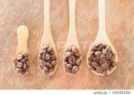 Coffee spoons on grunge wooden table Coffee spoons on grunge wooden table 16846106