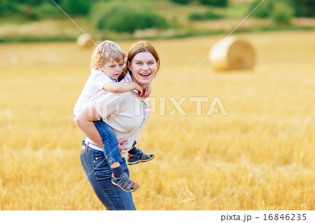 Young mother and her little son having fun Young mother and her little son having fun 16846235